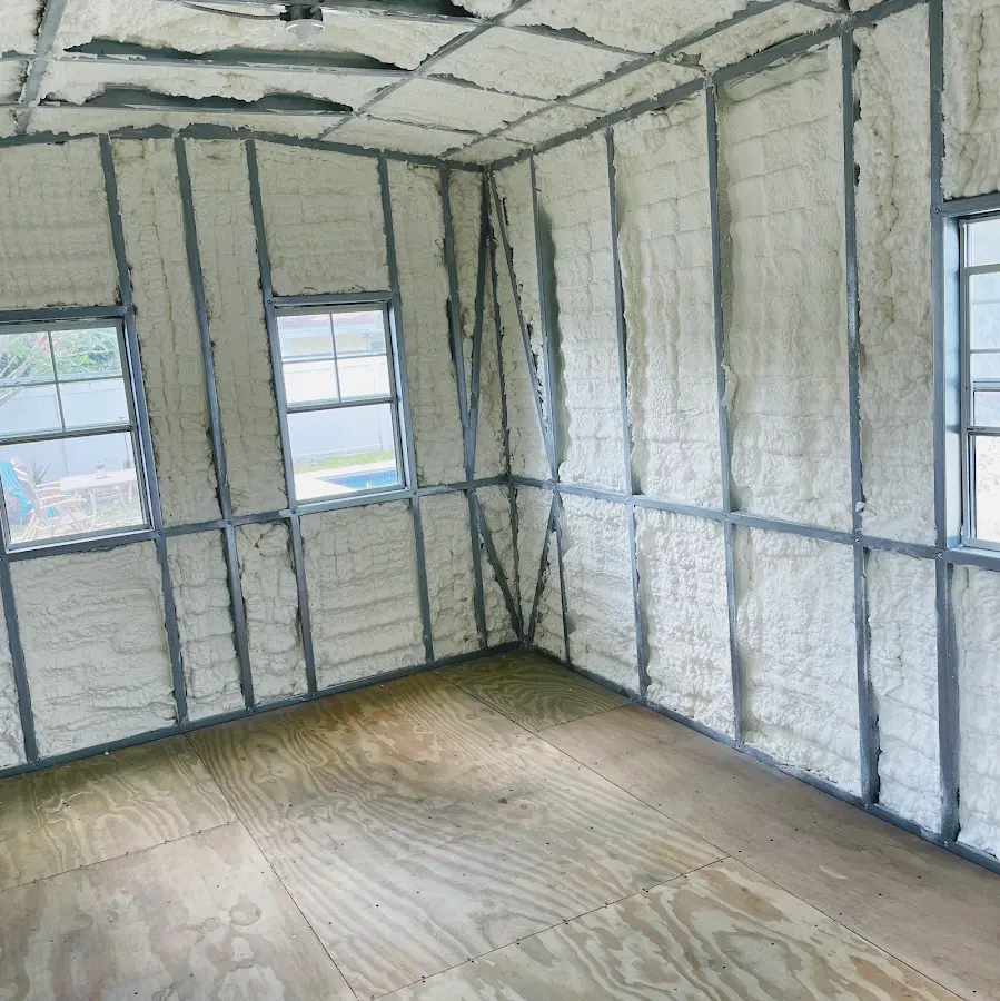 Closed-cell spray foam insulation applied to wall cavities in a residential project in Mokena